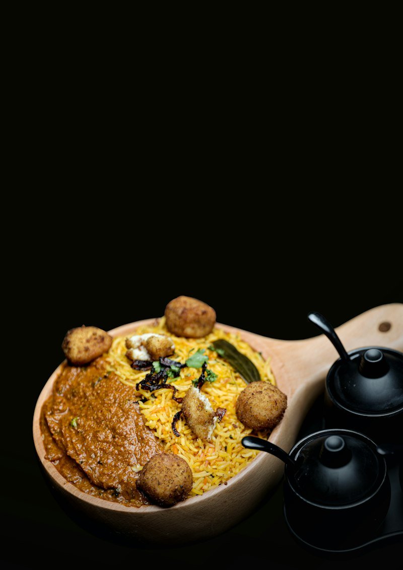 Mandi served in a wooden bowl with tender meat